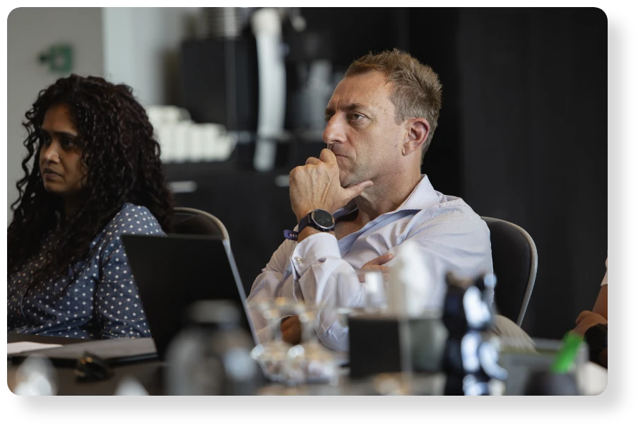 Strategy workshop participant listening thoughtfully